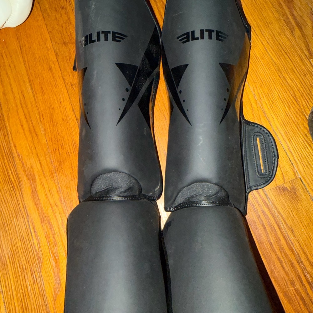 Elite Black Men's Shin Guards – Hard Shell Protection